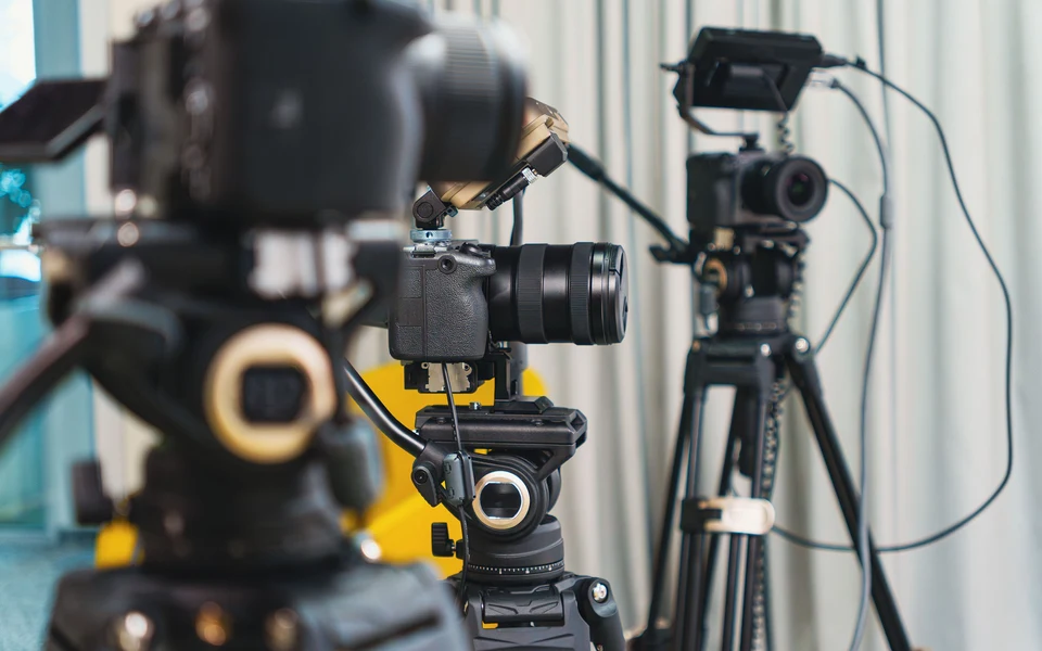 Camera and lighting equipment in a production studio; illustrative stock photograph, not Formativelabz people or facilities